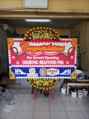 Papan Bunga di Pekutan Bayan